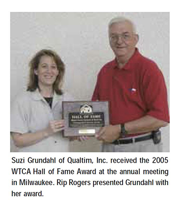 Suzi Grundahl receives 2005 WTCA Hall of Fame award from Rip Rogers.